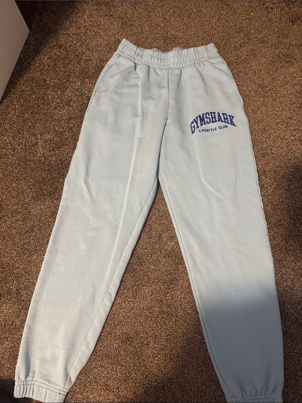 Gymshark Kids Pale Blue Joggers with Royal Blue Logo